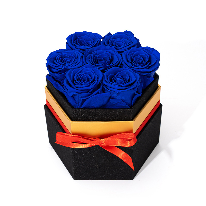 Sapphire blue preserved rose hexagon gift box with satin red ribbon